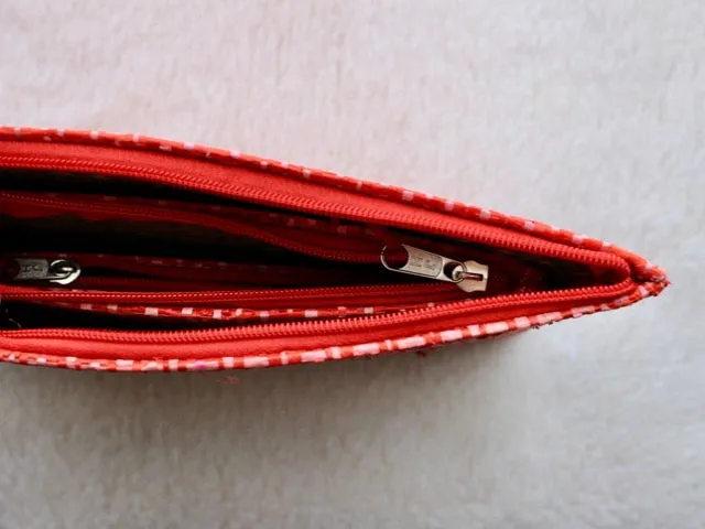 set of 3 hot pink and red raffia woven clutches with leather trim
