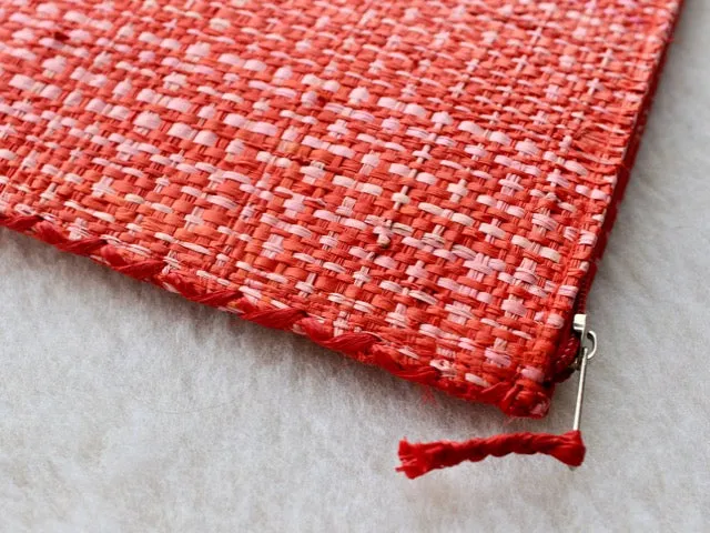 set of 3 hot pink and red raffia woven clutches with leather trim